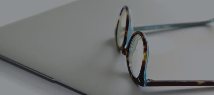 glasses on computer